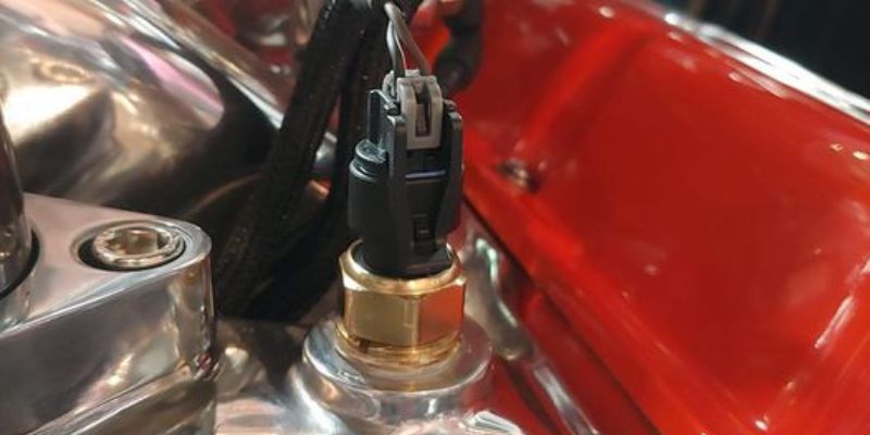 what does the engine coolant temperature sensor do